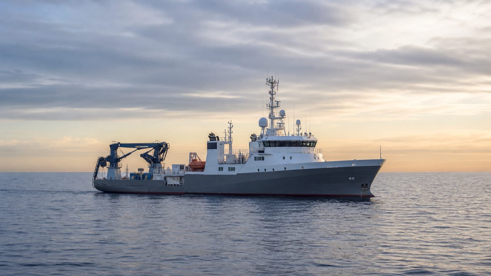 A research vessel underway at sea